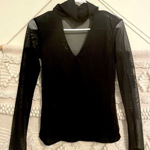 Sheer black long sleeve turtleneck. Charlotte Russe Size Small.